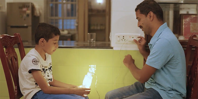 Arun and son with lightbulb