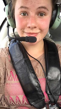 Samantha Fargo piloting a plane