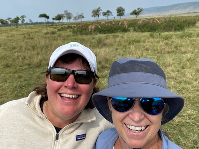 Jody and her wife, Michelle, with giraffes while on safari in Kenya in late 2021.